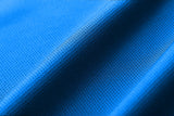 Blue fabric mesh texture design made of recycled polyester and spandex used for activewear t-shirts.