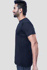 Side view of a man in a black recycled polyester activewear tee highlighting the design details.